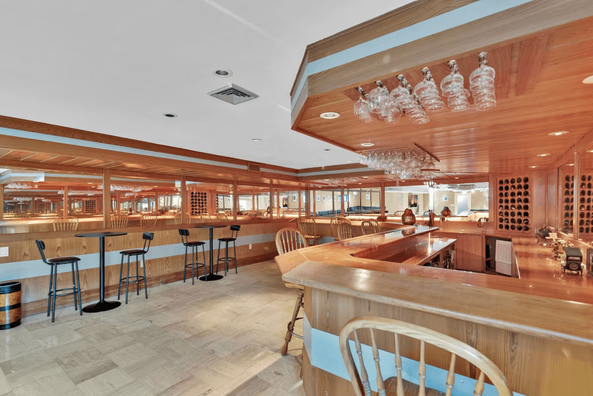 Large wood bar and entertainment room in the planned creator house