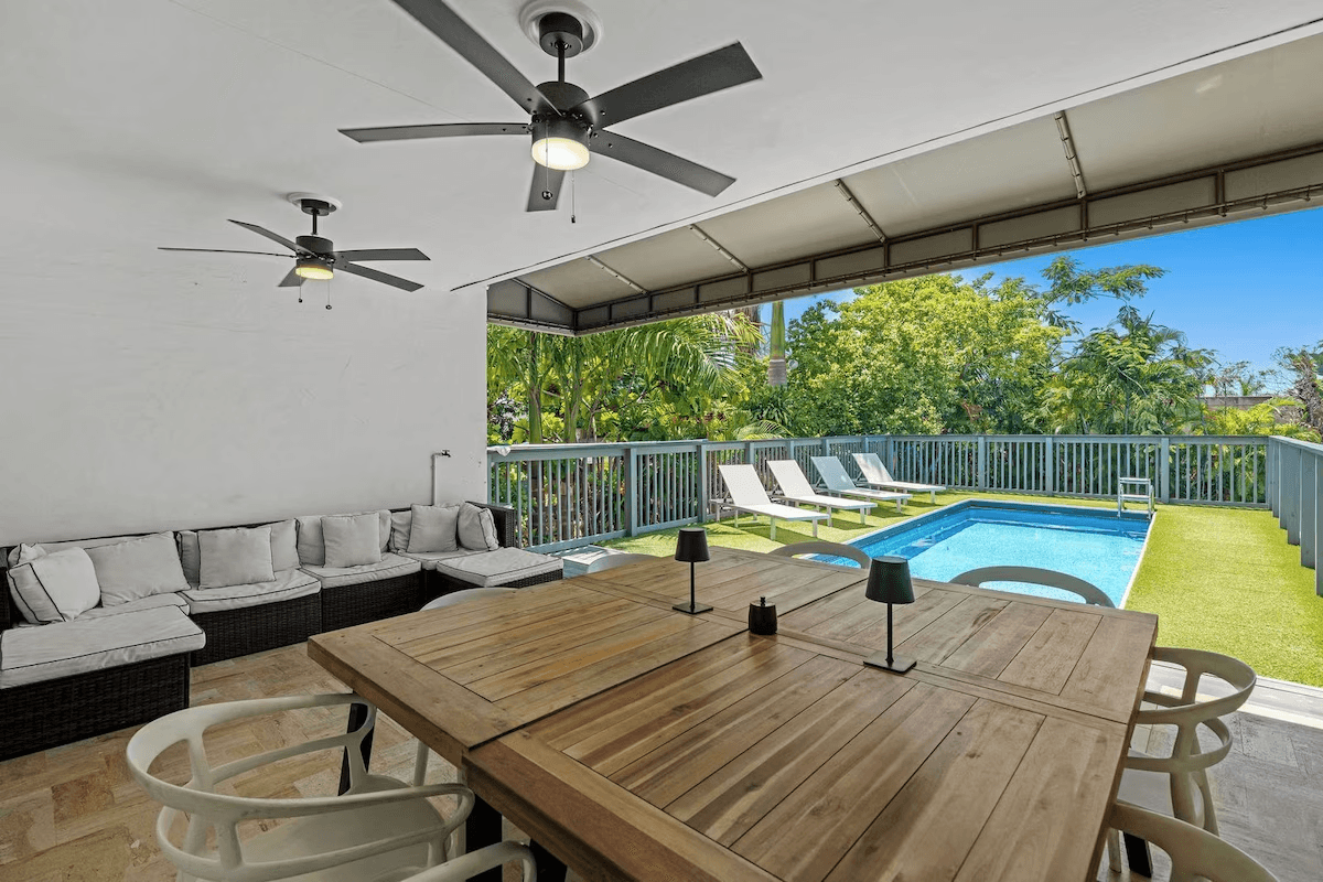 Covered dining terrace overlooking the creator house pool