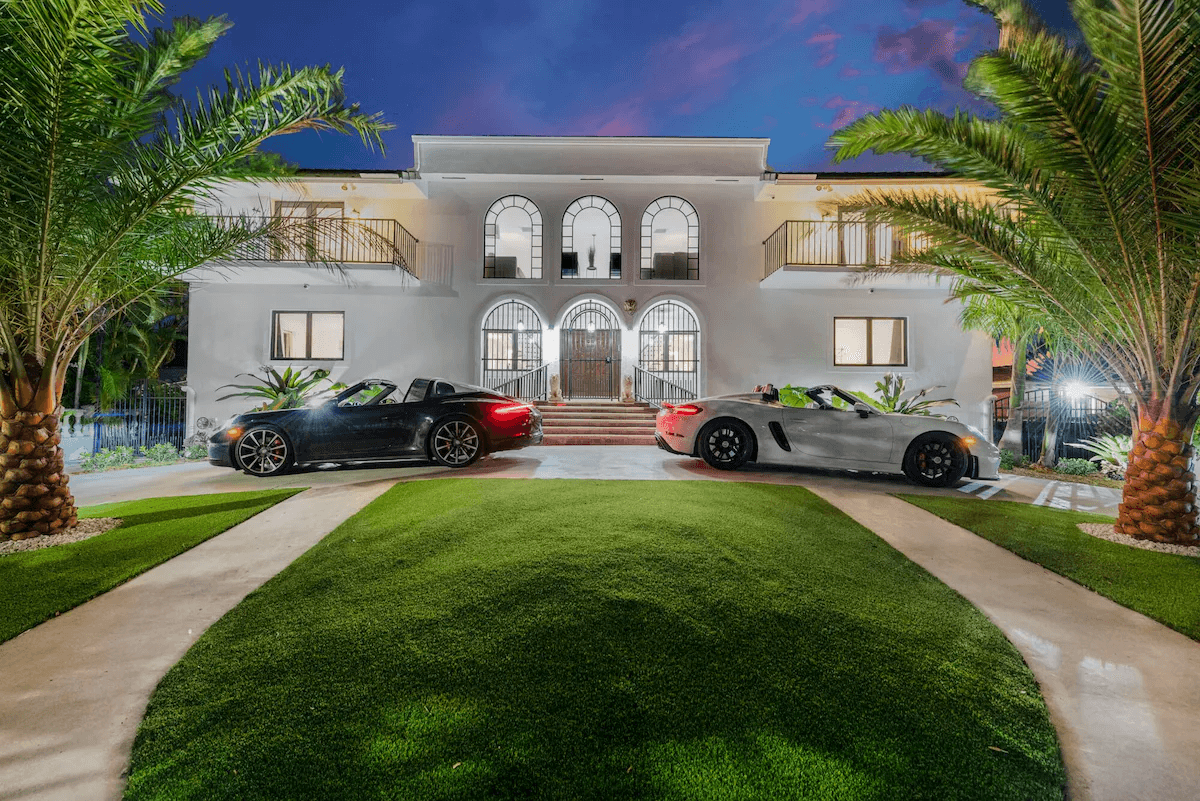 Front exterior of the planned Miami creator house at night